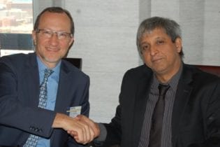 Total South Africa’s managing director and CEO, Christian des Closières and Prof. Adam Habib