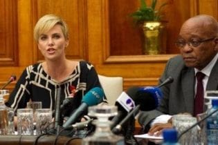 Charlize Theron and Jacob Zuma image