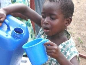 Child receiving water image