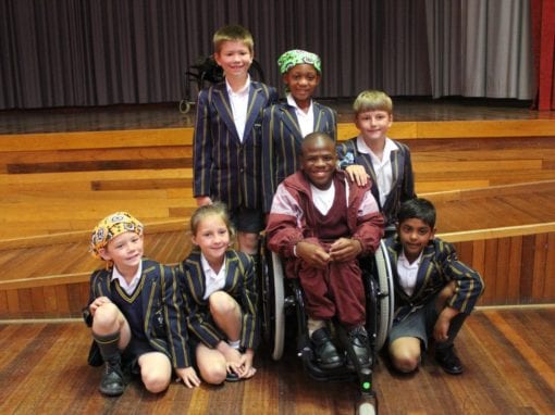 Denver Whitebooi with pupils from Merryvale Primary School in Port Elizabeth.