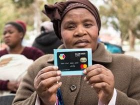 Langa resident with PACKA-CHING card