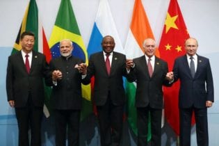 China's President Xi Jinping, Indian Prime Minister Narendra Modi, President Cyril Ramaphosa, Brazil's President Michel Temer and Russia's President Vladimir Putin pose for a group picture at the BRICS summit meeting in Sandton on July 26, 2018. Image: REUTERS/Mike Hutchings
