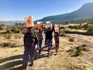 Fezeka Dzedze and her children still fetch water from a river despite R78-million being spent on a water project. Photo Wara Fana