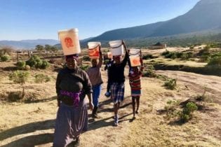 Fezeka Dzedze and her children still fetch water from a river despite R78-million being spent on a water project. Photo Wara Fana