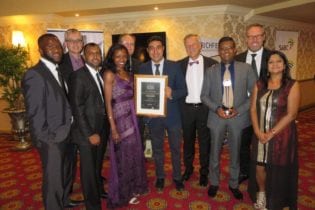 Bongani Mthombeni-Möller (Strategic Business Development Executive) and Arijit Mookerjee (Finance Director Africa) seen holding the certificate, CEO Kostas Rontiris and Kresen Manicum (Regional Manager, KZN), seen holding the trophy.