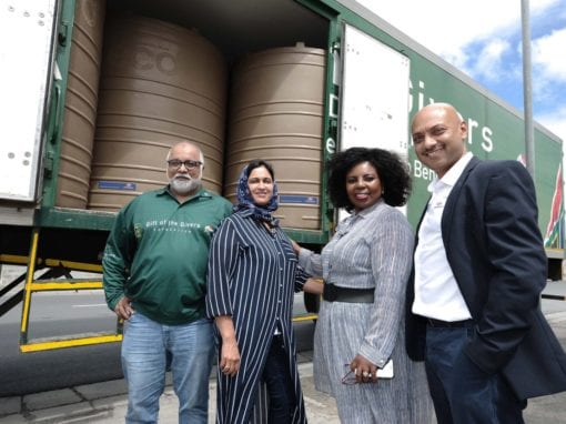 Bader Kazi from Gift of the Givers received 100 JoJo tanks from Engen CSI Manager Adhila Hamdulay, Head of Tranformation Unathi Njokweni Magida and Retail GM Seelan Naidoo to assist the drought stricken Makhanda community