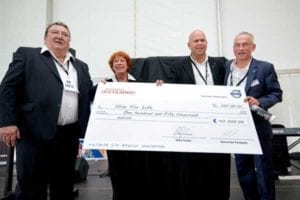 Thérèse Ducournau, Anders Lindblad and Jean-Noël Thénault pictured holding cheque