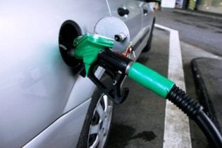 Filling a car with petrol image