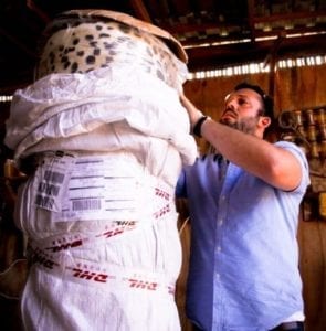 Greg Lomas unpacking the faux fur rolls