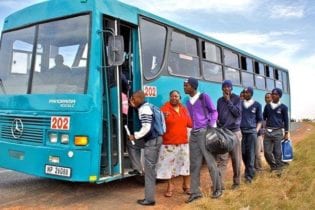 schoolkids boarding a bus