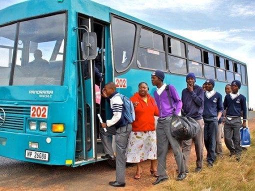 schoolkids boarding a bus