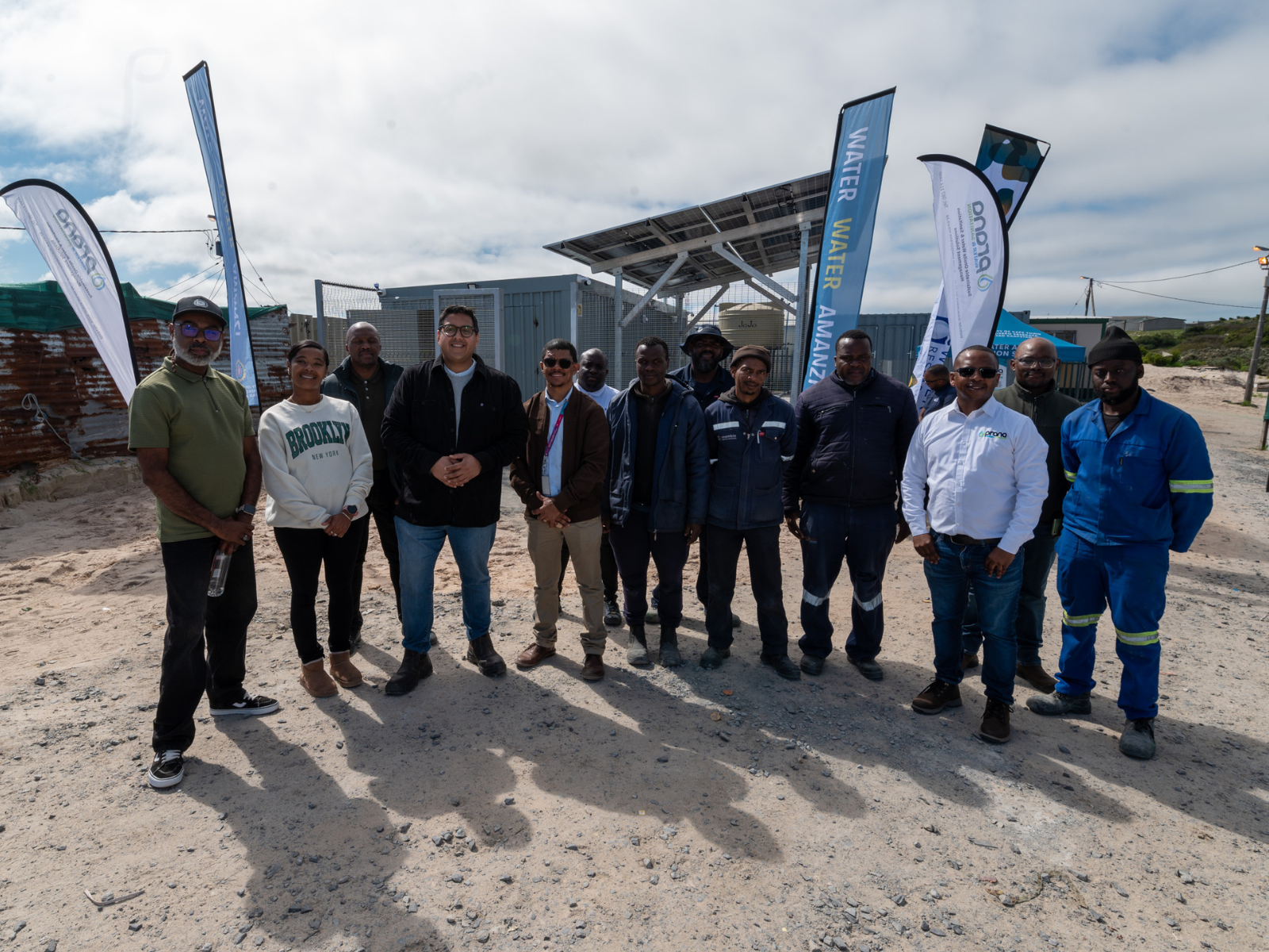 Councillors Badroodien and Jansen with the Water and Sanitation’s project team together with members of the 7de Laan community celebrate the launch of the high-tech sanitation pilot project.