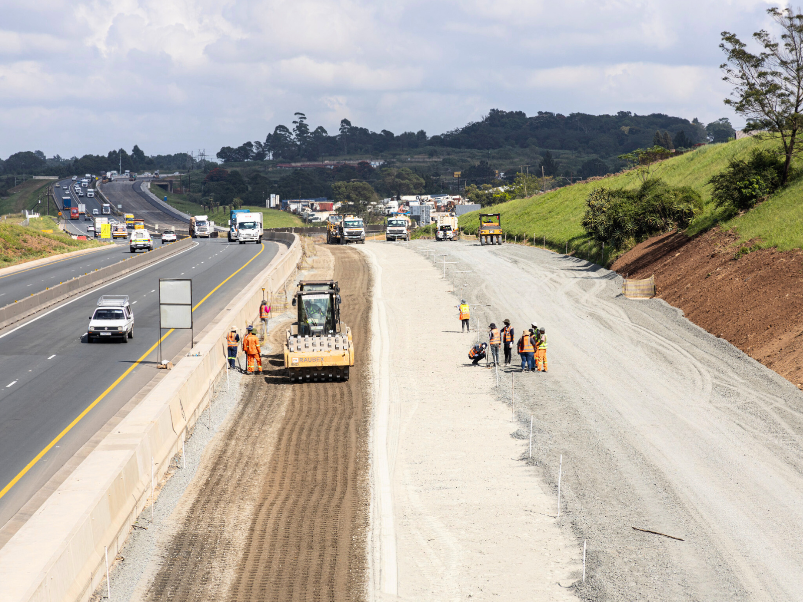 AfriSam laying a road with Roadstab cement bags and sand