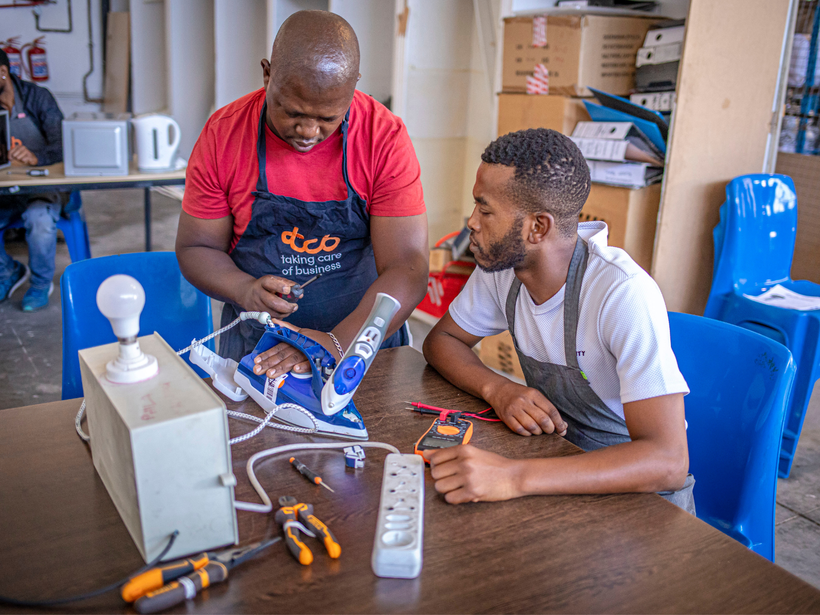 TCB clothing resellers ironing and waste recycling