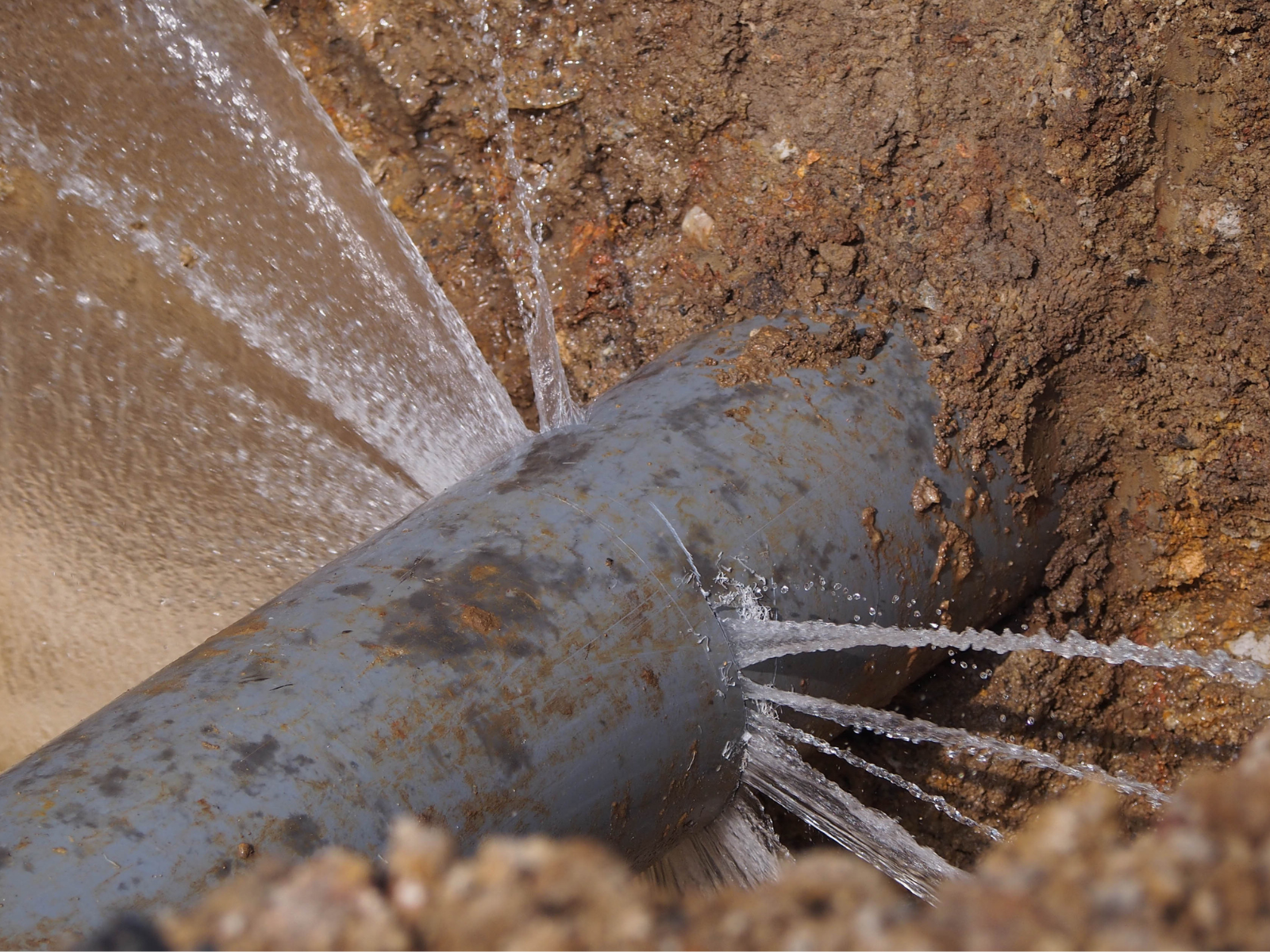 burst water pipe underground
