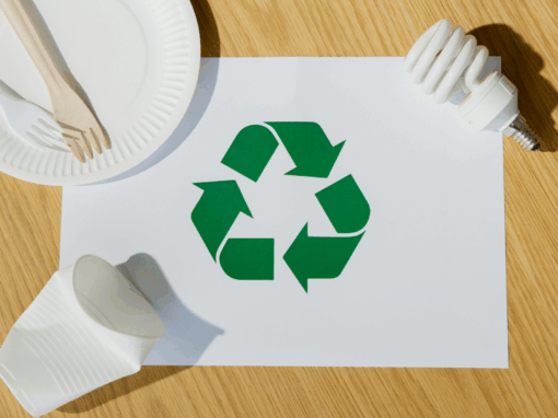 Recycling symbol surrounded by waste