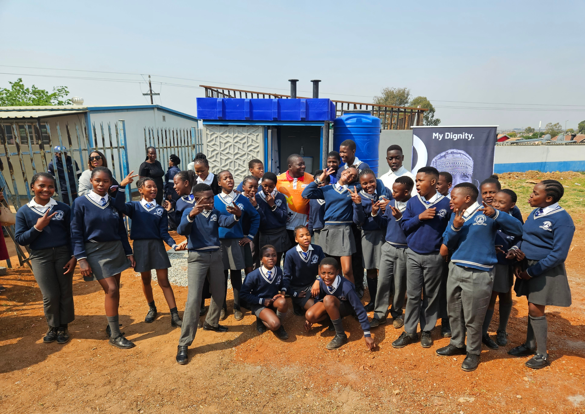School children and teachers at the opening of the new, safe toilets and handwashing facilities