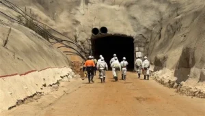 miners walking into a mine