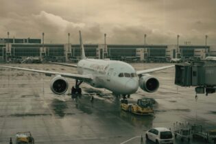 Airplane grounded in rainy weather