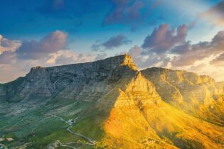 Drakensberg mountainside lit by sunlight