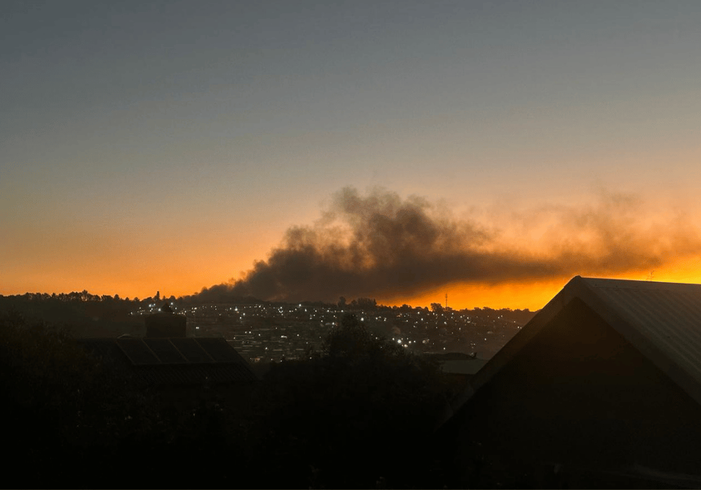 A Kya Sands rubbish pile burning at night