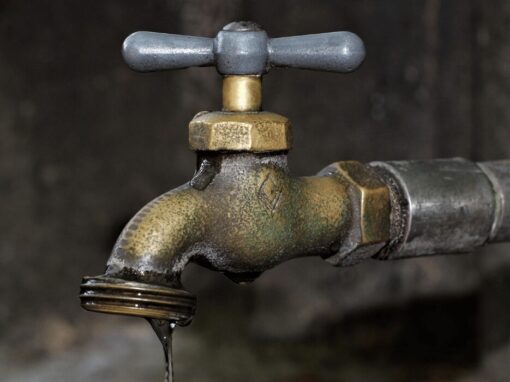 broken leaking tap water