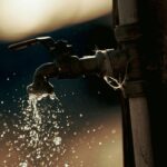 South African water access for public with an open tap