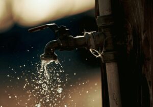 South African water access for public with an open tap