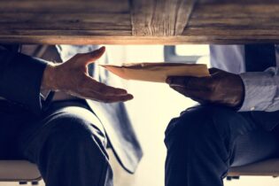 Under the table corruption and bribery package