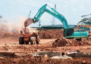 construction site filled with sand and machinery