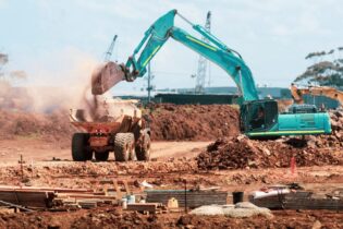 construction site filled with sand and machinery