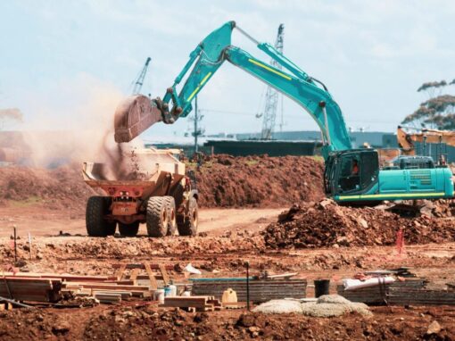 construction site filled with sand and machinery