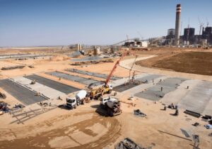 crane working on construction site at a mine