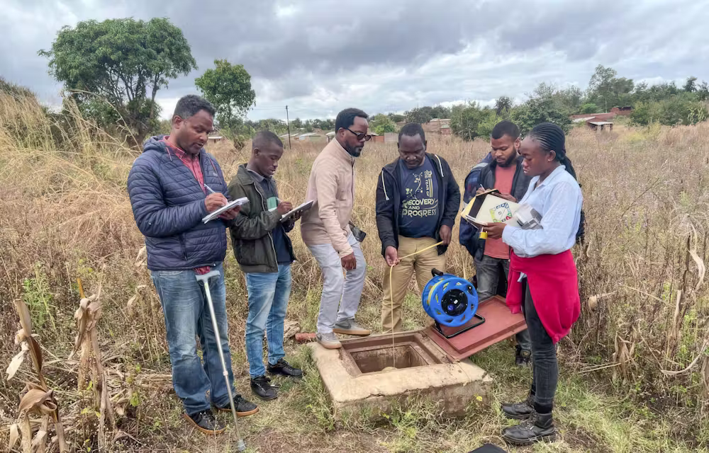 Girma Yimer Ebrahim and team inspecting boreholes in Malawi. Courtesy Claudio Pacacheque