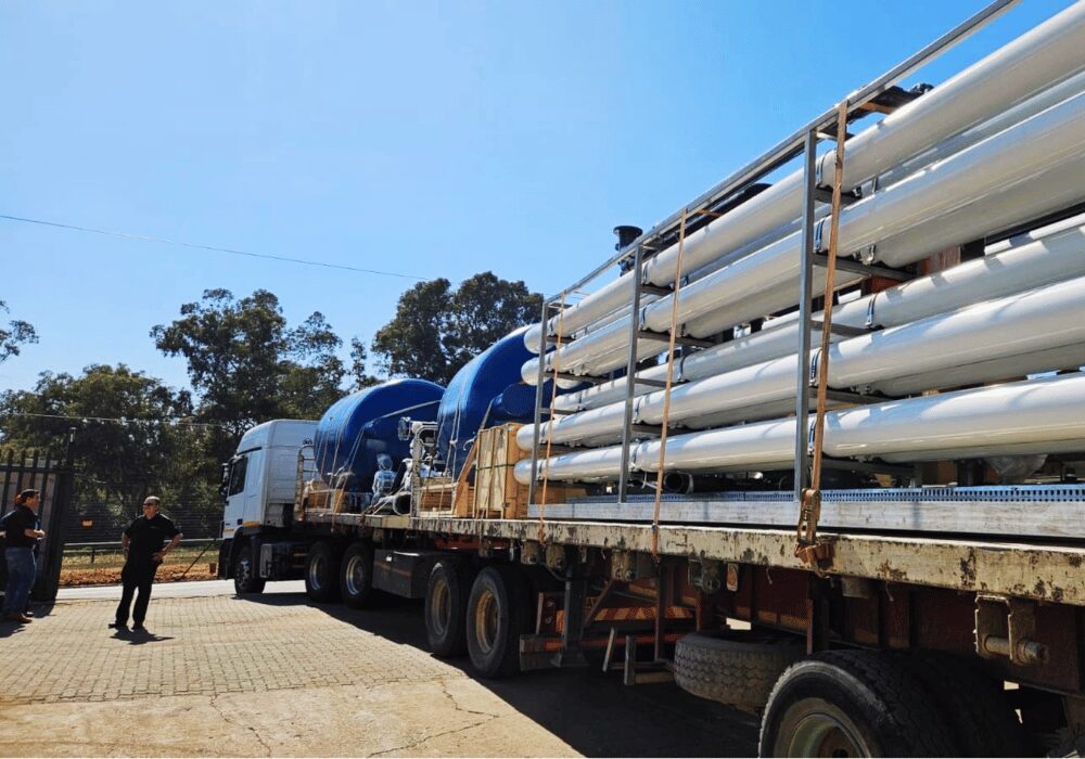 Watericon water treatment pipes on the back of a transportation truck