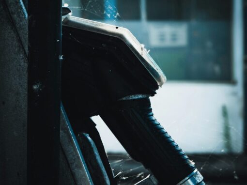 side view of a fuel pump in dark tones
