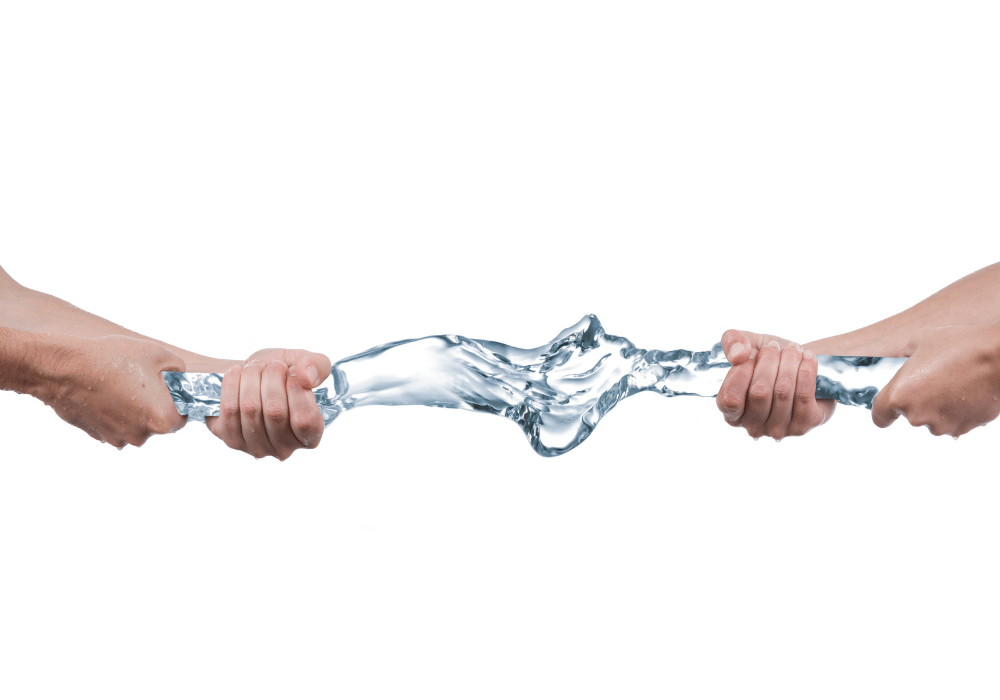 two hands pulling water