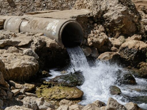 Groundwater coming out of large cement pipe
