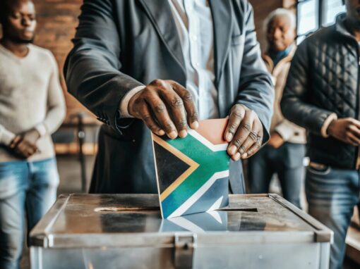 South African flag into voting ballot box