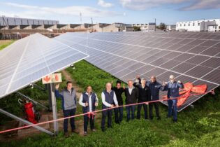 Volkswagen Group Africa Completes Solar Panel Project At Component Plant cutting the ribbon
