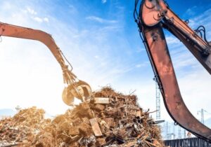 building cranes in a metal recycling yard