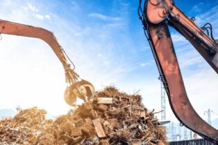 building cranes in a metal recycling yard