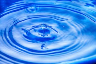 droplet of water in a pond