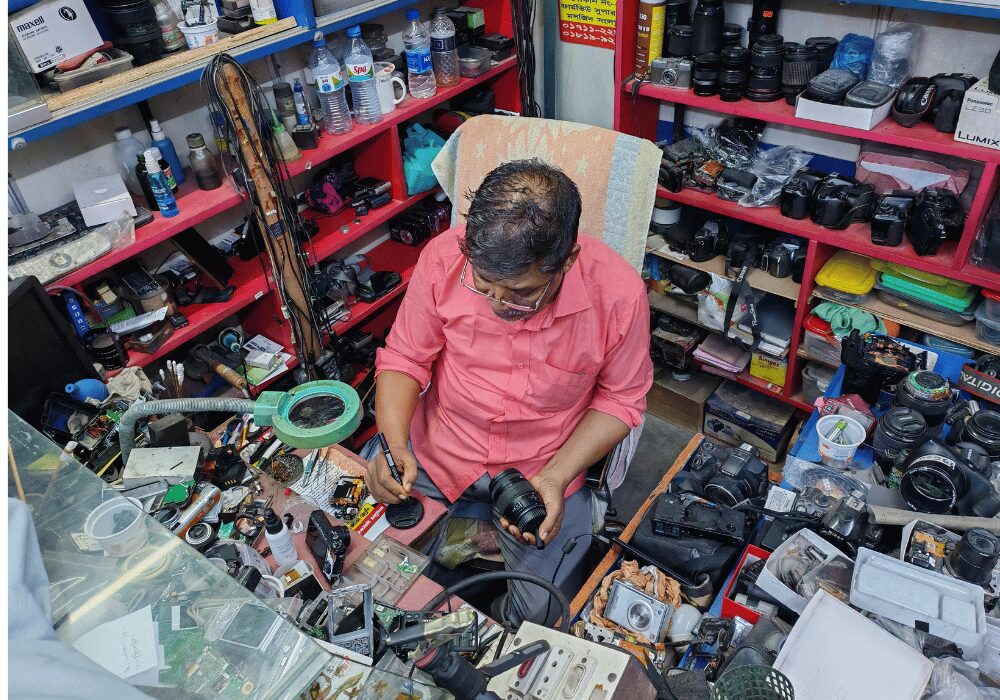 man working on second hand devices