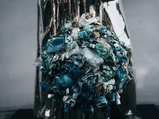 rubbish bin piled with plastic