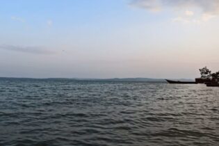 A lake with a distant shoreline