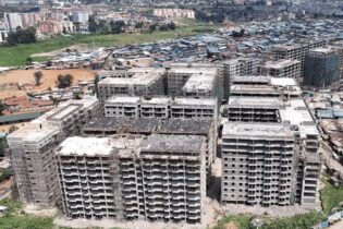 New apartment blocks rise where corrugated-iron structures once stood in Kibera, Nairobi