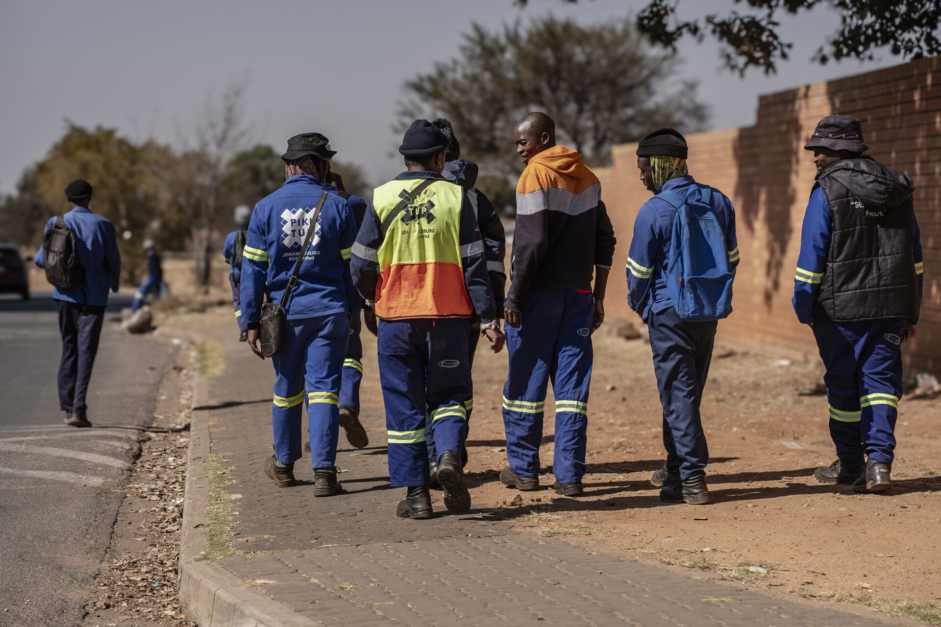 Workers outside the gates to the Pikitup Avalon depot in the south of Johannesburg