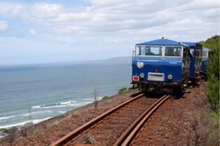 blue train cart on a railway in South Africa