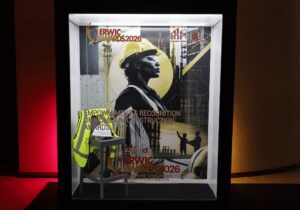 cidb's 2026 ERWIC Awards magazine cover behind a frame